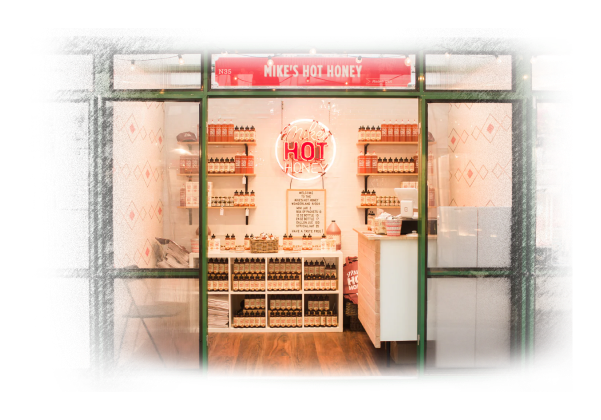 Mike’s Hot Honey Bryant Park kiosk and neon sign